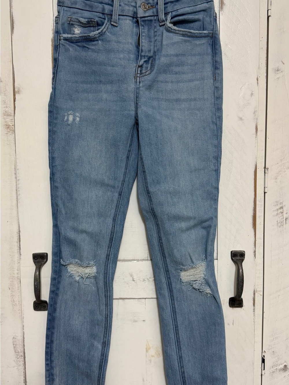 Buckle Light Blue Distressed Skinny Jeans
